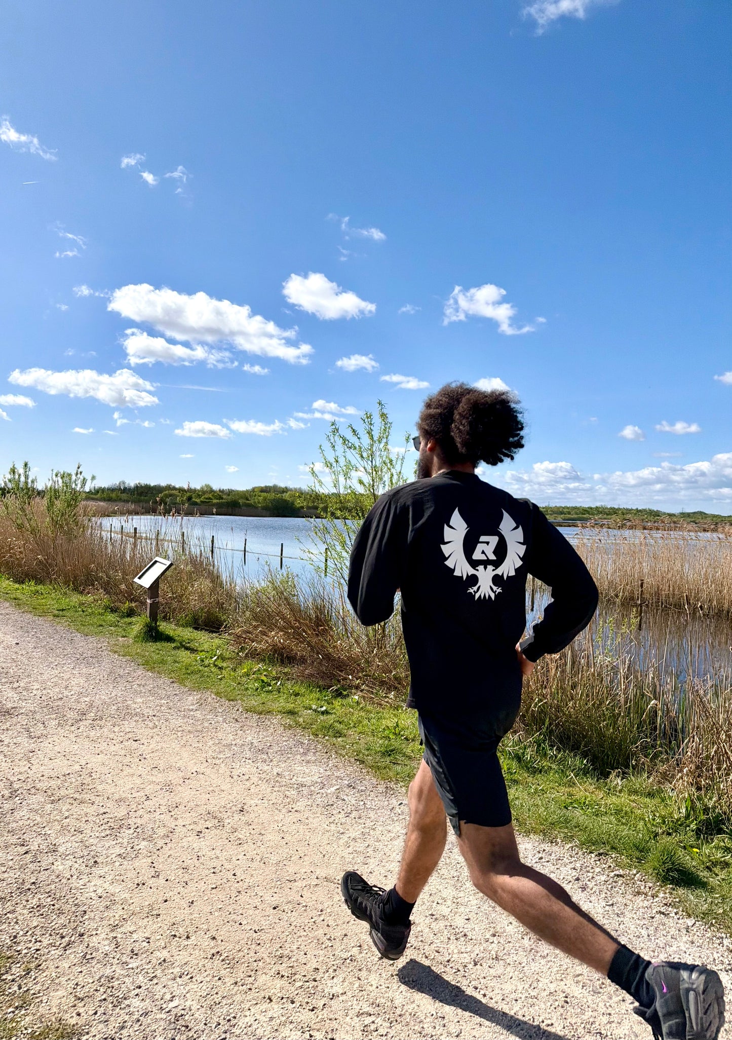Running in the Phoenix Crest long sleeve tee