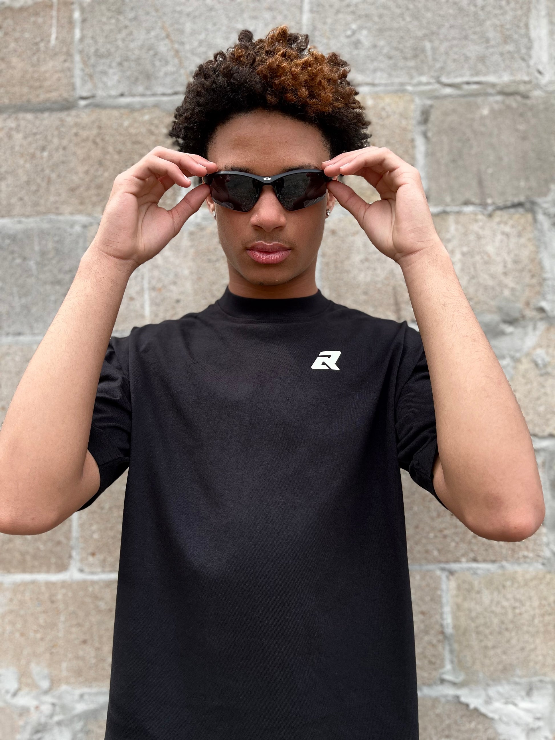 Model wearing Rare Athletics heavyweight cotton tee
