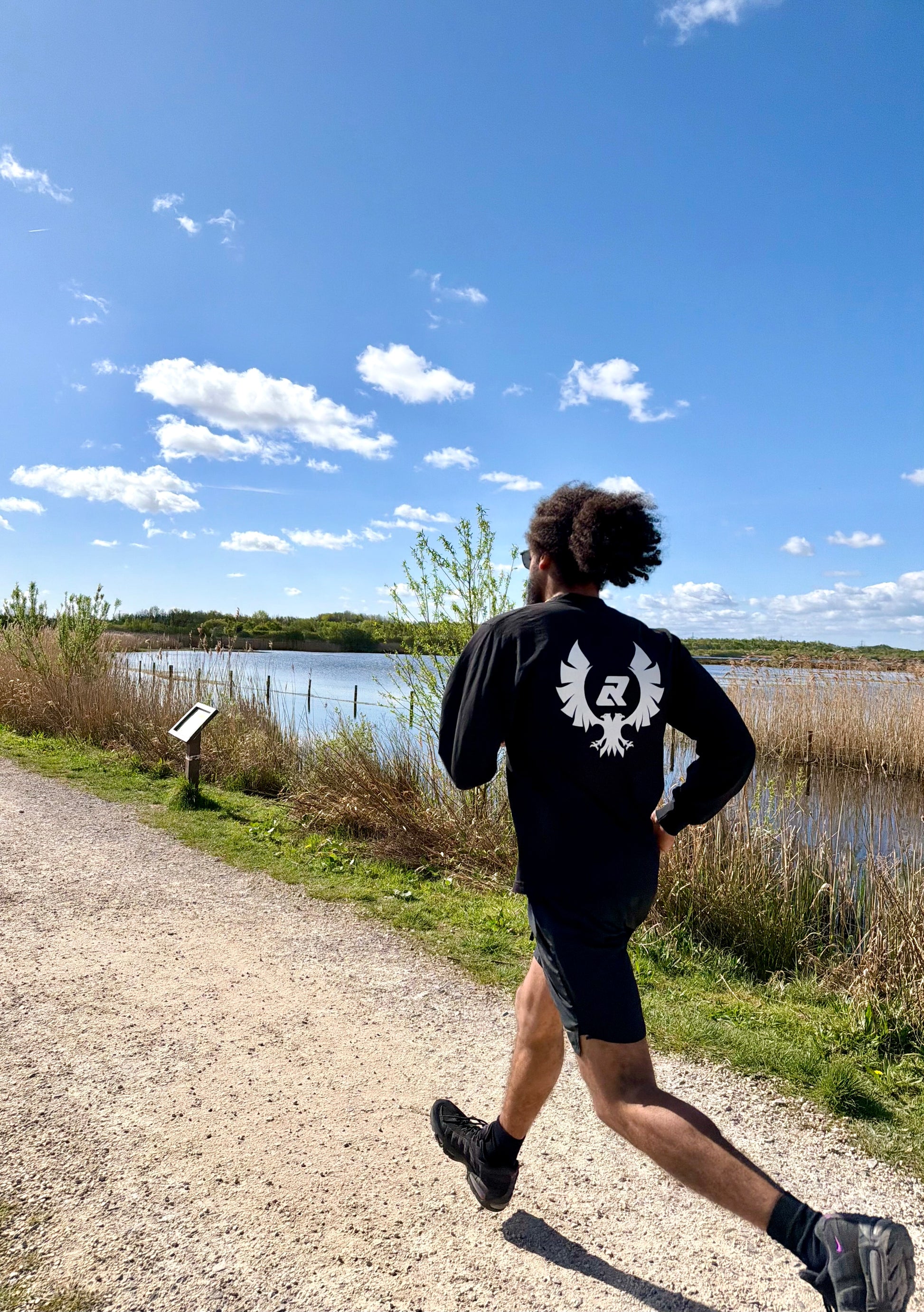 Running in the Phoenix Crest long sleeve tee