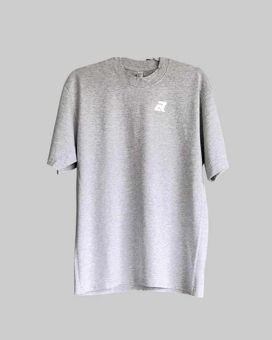 Gray t-shirt with a small logo on a white background